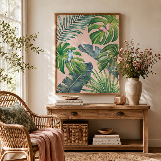 Living room with wicker chair, wooden console table, and tropical leaf artwork.
