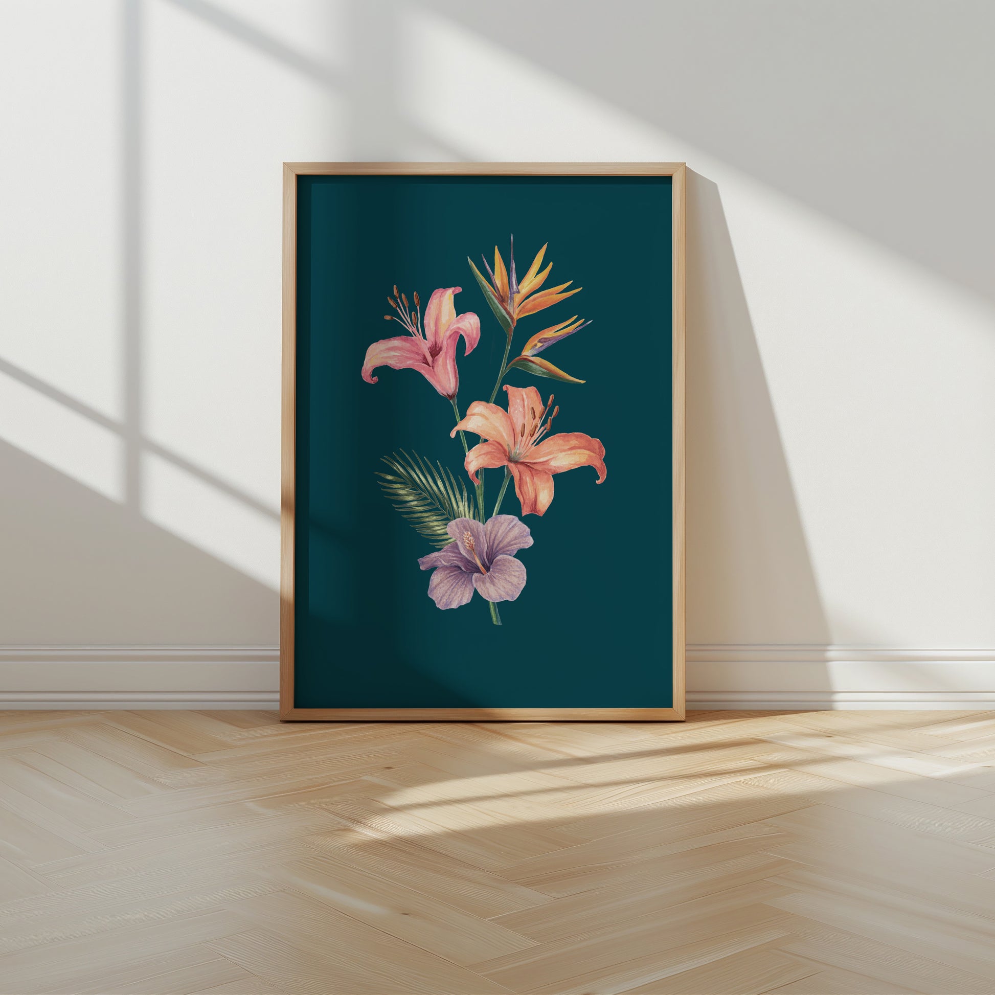 Framed floral artwork on a wall with sunlight casting shadows.