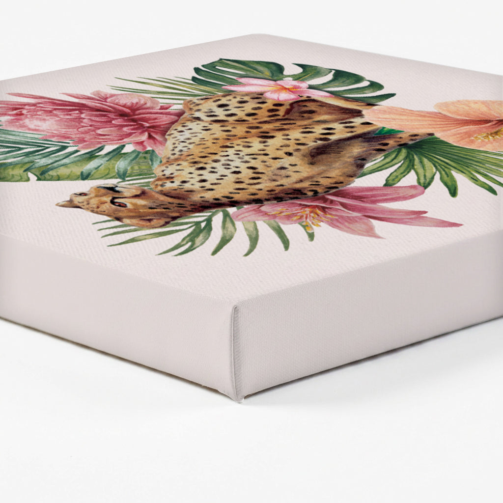 Close up of a corner of stretched canvas art with a leopard and floral design.