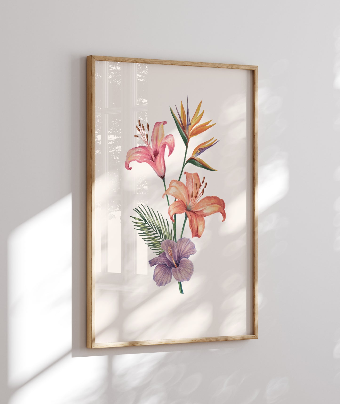 Framed botanical artwork with flowers on a white wall