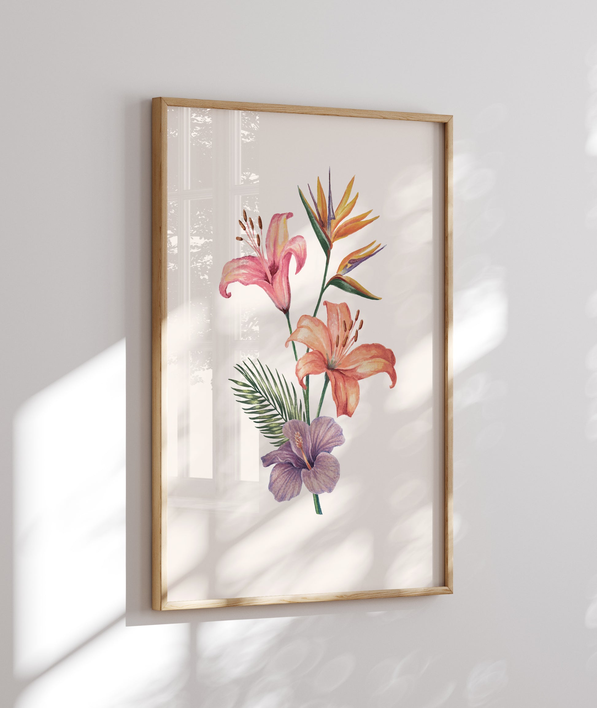 Framed botanical artwork with flowers on a white wall