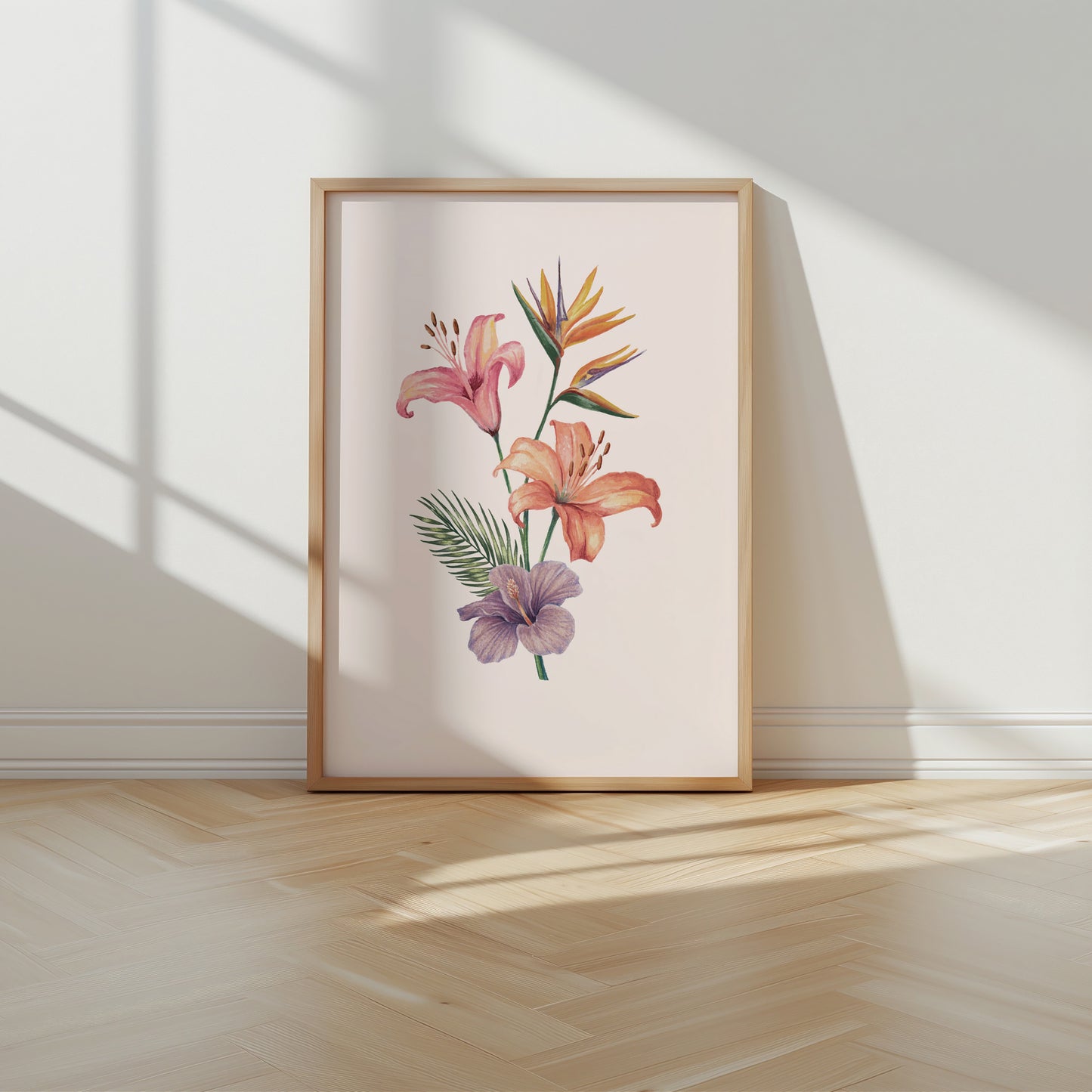 Framed floral artwork on a wall with sunlight casting shadows.