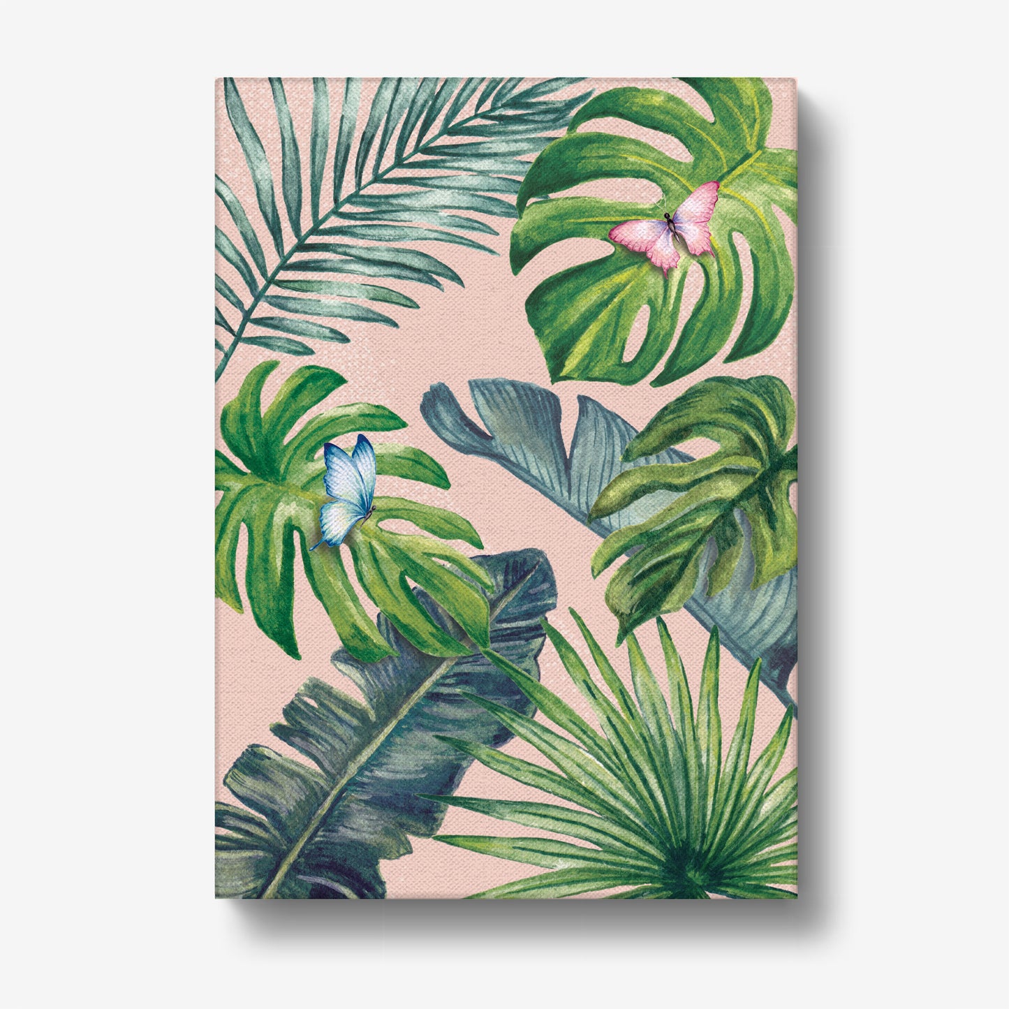 Canvas art print with tropical leaf design on a pink background