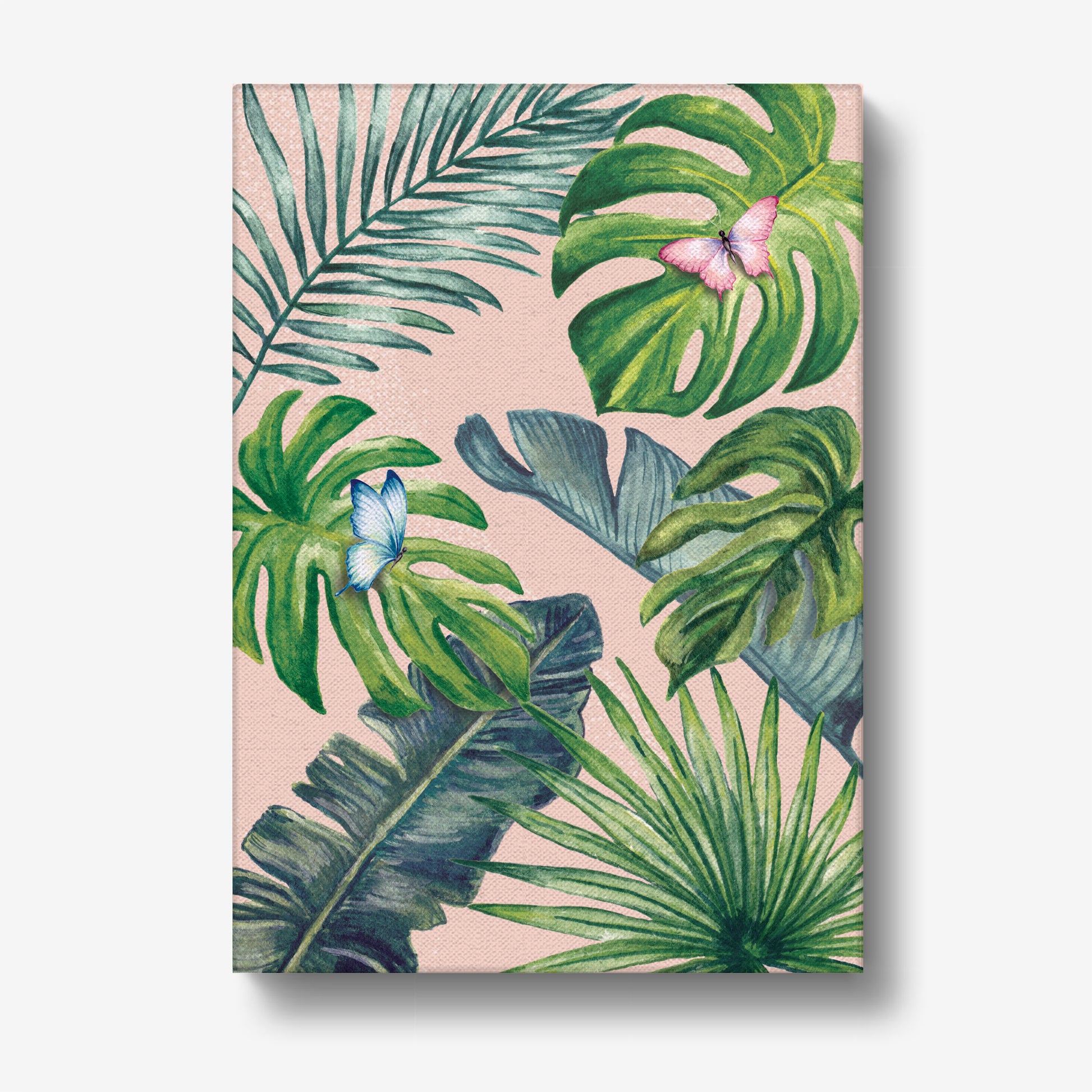 Canvas art print with tropical leaf design on a pink background